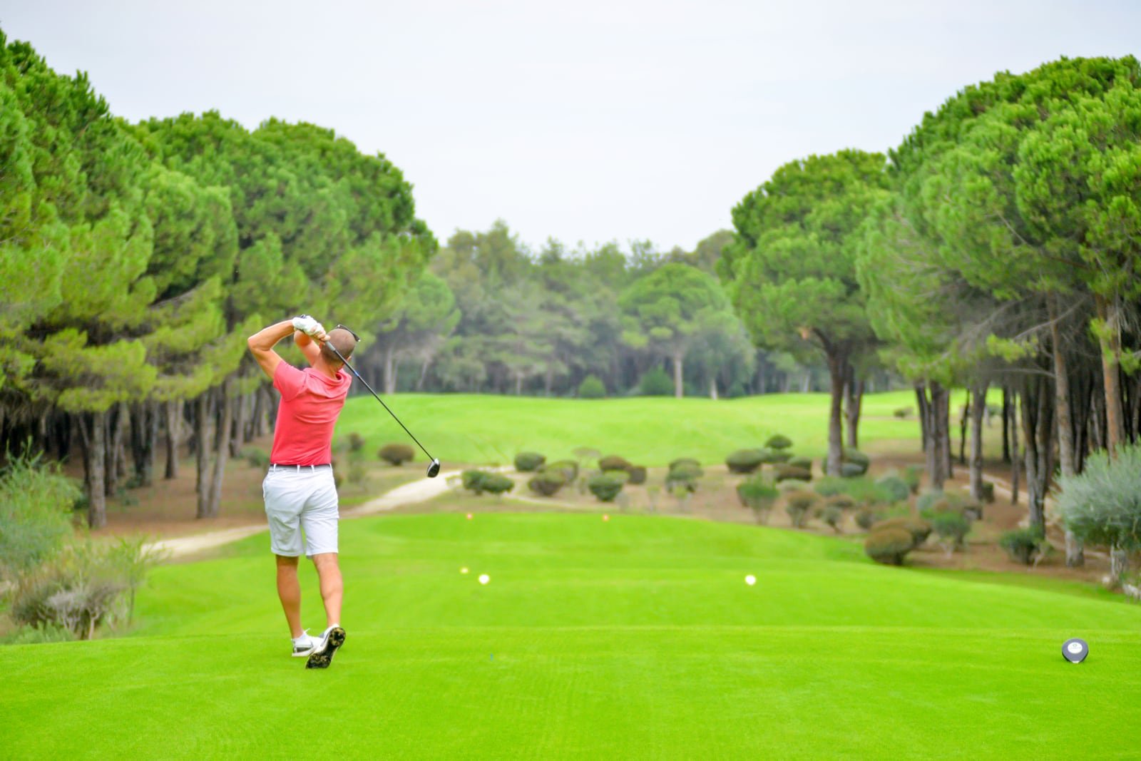 Manicured golf fairway and open sky for a polished Vietnam golf holiday