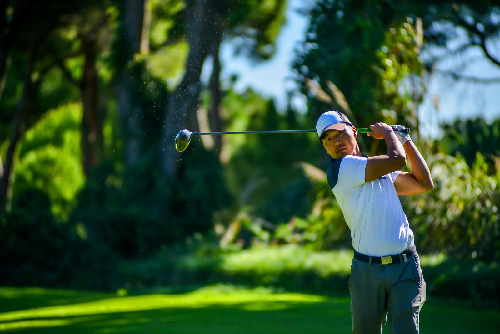 Manicured golf fairway and open sky for a polished Vietnam golf holiday