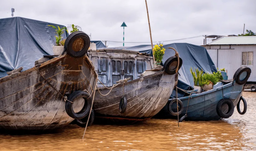 Traditional boats at a floating market in the Mekong Delta Vietnam