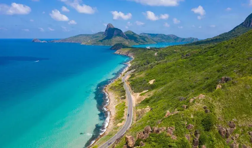 The road runs right along the coast in Con Dao