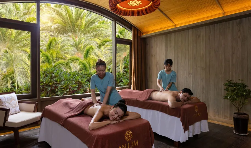 Professional spa therapists providing treatments at a wellness retreat in Vietnam