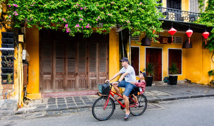 Cycling through Hoi An on a biking tour in Vietnam